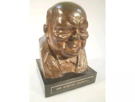 After Van Cutsom. Bronze bust of Winston Churchill on plinth signed and dated 1945