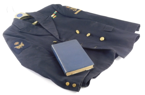 A Royal Navy jacket (Arctic convoys) and a Manual Of Seamanship book. (2)