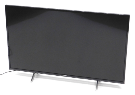 A Panasonic 43'' LCD TV, with remote.