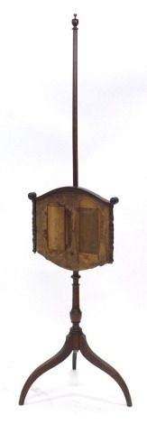A 19thC mahogany pole screen, with a vacant banner, (AF), turned column and tripod base, 141cm high.