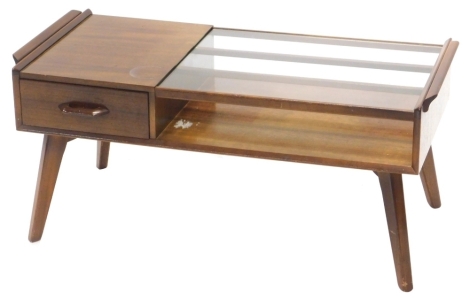 A G-Plan Gomme design coffee table, the rectangular top with part glazed, above a drawer and a recess on square section tapering legs, 88cm wide.