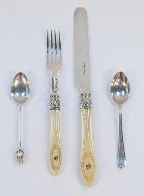 A small group of silver wares, comprising a pair of silver and ivory handled knives and forks, the ivory handles with beaded detailing and bearing the initial H, with silver ferrules, Elkington & Co, Sheffield 1890, together with a silver golfing teaspoon - 3