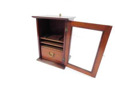 A Victorian mahogany smoker's cabinet, with out swept pediment above a glazed door enclosing two sliding shelves and a single drawer, 32cm high, 23cm wide, 17cm deep. - 2