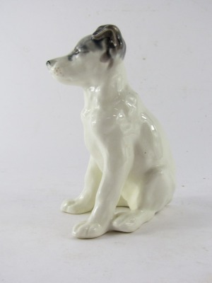 A USSR Konakova porcelain figure of a seated dog, on a white glazed ground with grey spotting, printed marks, 20cm high. - 2