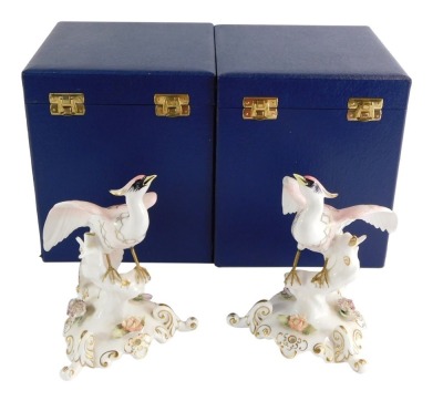 A pair of Royal Crown Derby porcelain figures of Chelsea Birds, designed by J Plant and ME Townsend, both boxed. (2)