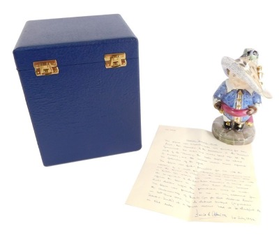 A Royal Crown Derby porcelain figure of a Mansion House Dwarf, dedicated on the hat as Presented to David Atkinson, Regional Chairman, British Gas East Midlands On His Retirement on 30th June 1992, printed and painted marks, boxed.