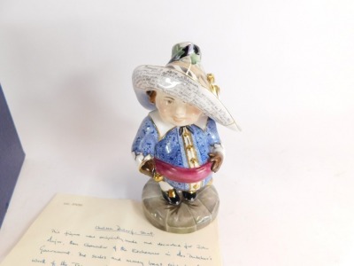 A Royal Crown Derby porcelain figure of a Mansion House Dwarf, dedicated on the hat as Presented to David Atkinson, Regional Chairman, British Gas East Midlands On His Retirement on 30th June 1992, printed and painted marks, boxed. - 2