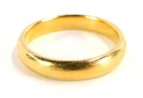 A 22ct gold wedding band, of plain design, size Q 1/2, 6.4g.