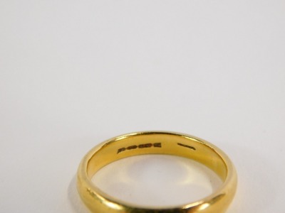 A 22ct gold wedding band, of plain design, size Q 1/2, 6.4g. - 2