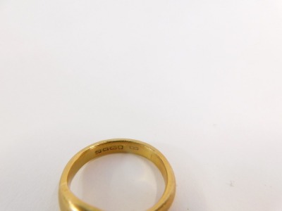 A 22ct gold dress ring, with illusion set ruby, on a converted band, Birmingham 1927, size S 1/2, 9.7g all in. - 2