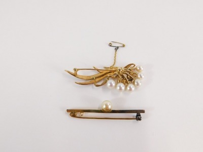 Two bar brooches, comprising a floral spray brooch, with cultured pearl bead attachments, on floral spray, yellow marked stamped K14, 10.7g all in, 6cm wide, together with a single pin bar brooch, with central cultured pearl, yellow metal stamped 9ct, 3.8 - 2