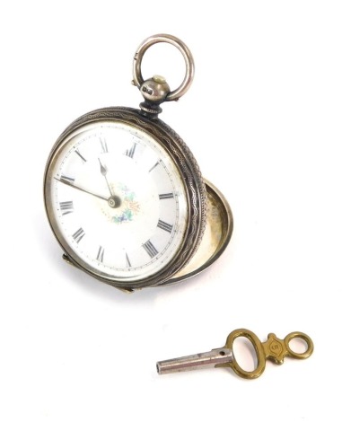 A Victorian lady's silver pocket watch, open faced, key wind, white enamel dial bearing Roman numerals and painted centrally with a dove, the case with floral and foliate engraving, shield reserve, Birmingham 1886, 41.8g all in, with key.