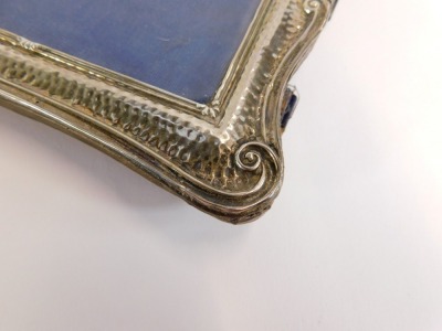 Two Edward VII silver backed strut photograph frames, comprising an embossed floral and basket weave frame, with rectangular mirror plate and vacant shield top, maker W J Myatt & Co, Birmingham 1904, photograph size 8cm x 12cm, together with a further fra - 3