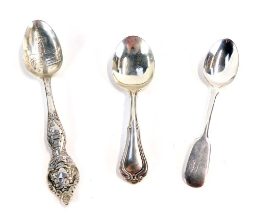 Three silver and plated spoons, comprising a fancy silver caddy spoon, Birmingham 1915, a Brooklyn Bridge New York commemorative souvenir spoon, stamped Sterling, 1 1/2oz, together with a silver plated diddle pattern teaspoon, bearing monogram M.