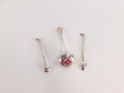 A group of silver and plated spoons, comprising two Victorian silver riding crop salt and mustard spoons, and a silver plated sifter spoon. (3) - 2