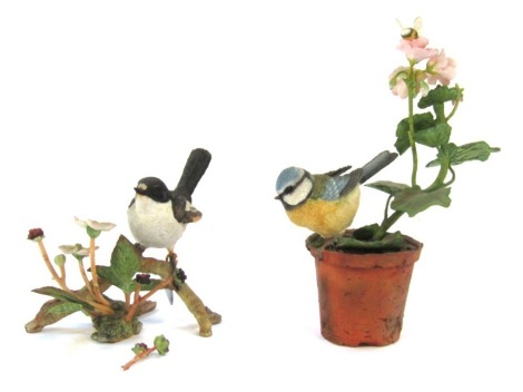 Two Country Artist figures, comprising Flycatcher of Woodland Glade, No 04163, 13cm high, and Dawn Chorus Blue Tit on pot, No 04030, 22cm high, boxed. (AF)