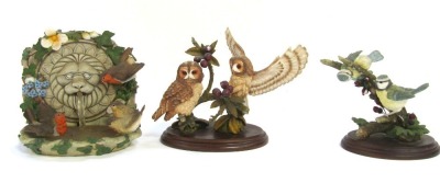 Three Country Artist figure groups, comprising a pair of Blue Tits with hawthorn berries, No 01299, 15cm high, a Danbury Mint Bath time by Anne Richmond figure group, 17cm high, and Country Artist Tawny Owl pair with wild cherries, No 01927, 16cm high, wi