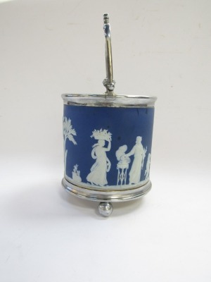 A Wedgwood late 19thC blue and white Jasper ware biscuit barrel, with plated mount, lid and swing handle, on a plated base raised on ball feet, 20cm high. - 4