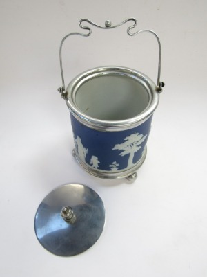 A Wedgwood late 19thC blue and white Jasper ware biscuit barrel, with plated mount, lid and swing handle, on a plated base raised on ball feet, 20cm high. - 5