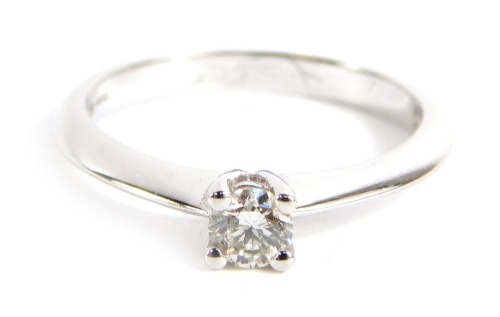 A 9ct white gold diamond solitaire ring, with round brilliant cut diamond approx 0.15cts, in four claw basket setting, ring size N, 2.2g all in. Note: VAT is payable on the hammer price of this lot.