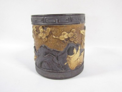 A Bretby planter, on black ground with Oriental figures and flowers, stamped to underside, 22cm high. (AF) - 4