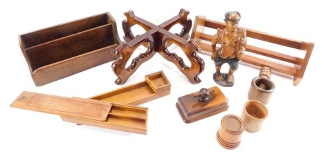 A group of treen, to include an oak book rack, oak letter rack, dominoes case, carved tribal figure of a gentleman, etc. (1 tray)