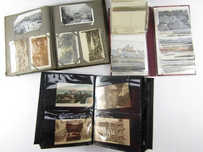 Three postcard albums, containing English and European topographical cards, sentimental and humorous cards. - 2