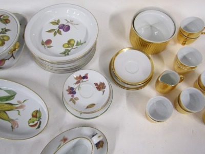 A Royal Worcester Evesham pattern dinner and oven wares, comprising graduated set of three tureens and lids, serving tray, teapot, flan dish, bowls, gravy boat, dinner plates, saucers, etc, and a Royal Worcester gold lustre finish part tea service, compri - 2