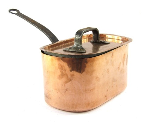 A 19thC copper fish poacher and lid, of oblong form with craft detailing on iron handles, unmarked.