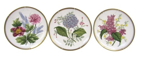 A set of three Spode Garden Flower Series collector's plates, comprising No 3 Lilac, No 1 Hydrangea, and No 4 Peony.