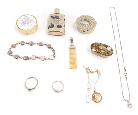 A group of white metal and other trinket boxes, a Alpaca Mexico stone set pill box, a similar circular pill box, set with mother of pearl, silver framed pendant, two silver necklaces, two silver dress rings, a silver plated cased scent bottle, and a 9ct g