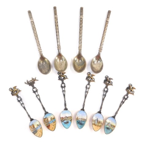 A set of six Continental enamel teaspoons, each with lion finial top on a pierced stem, on gold coloured base, with enamel front, depicting Italian scenes, white metal stamped 800, 1 3/4oz, together with a set of four plated teaspoons.