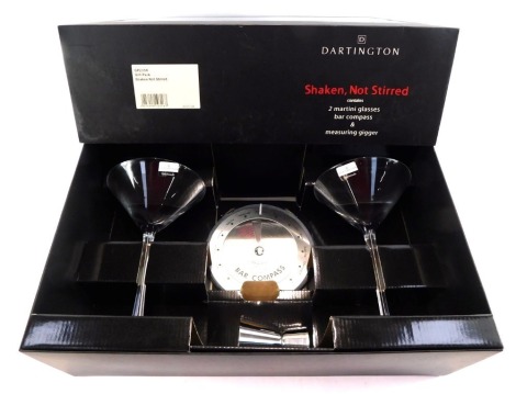 A Dartington crystal martini glass gift set, 'Shaken not Stirred', comprising tow martini glasses, a bar compass and measuring gigger, boxed.