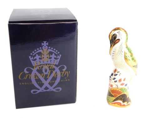 A Royal Crown Derby Imari paperweight modelled as a green woodpecker, printed marks, gold stopper, boxed.