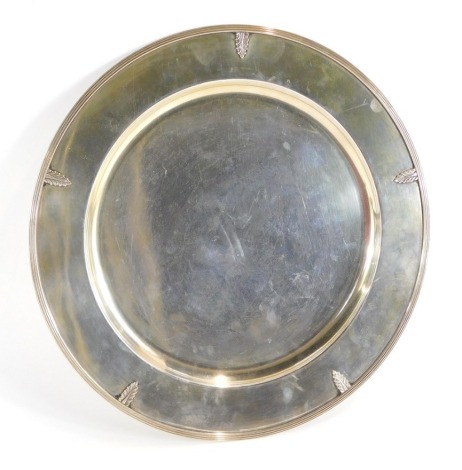 A circular salver, with fluted and acanthus leaf border, stamped Calderon 800, 34cm diameter, 27oz.