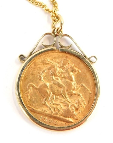 An Edward VII full gold sovereign pendant and chain, dated 1903, in a 9ct gold mount, on a 9ct gold neck chain, 13.1g all in. (AF)