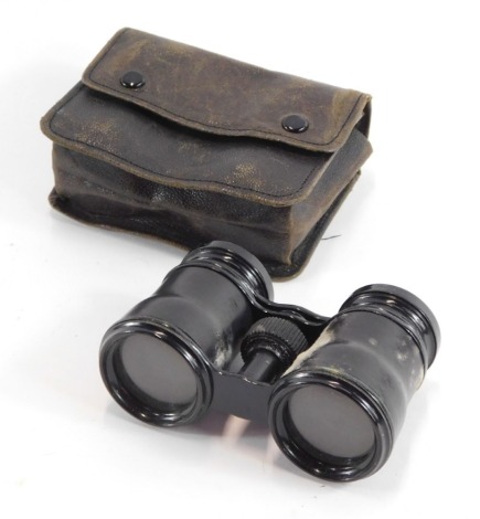 A set of opera glasses, with black leatherette finish, in a carry case.