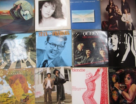 A group of 33rpm records, including Elvis, Bob Dylan, Derek & Clive, 70's and 80's bands, etc. (3 boxes)