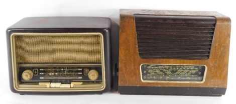 Two vintage radios, comprising a 1950/60's walnut cased radio and another in brown bakelite case.