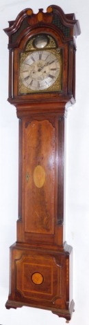 R Winstanley, Omskirk. A 19thC mahogany longcase clock, with brass dial marked Winstanley, Omskirk, with silvered Roman numeral chapter ring and date aperture, eight day movement, with two weights and pendulum, on arched pediment hood, above single door w