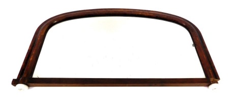 A 19thC walnut overmantel mirror, on ceramic supports, 59cm high, 100cm wide, 5cm deep.