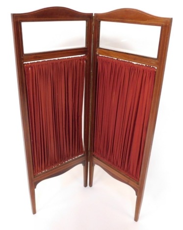 A late 19thC mahogany two fold vanity screen, with glazed top panel, with red lining, on arched fret work base, 115cm high, 86cm wide, 3cm deep.