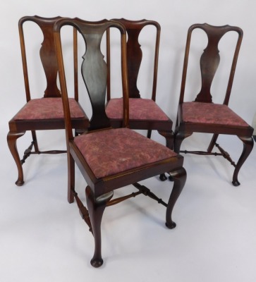 A set of four early 20thC mahogany dining chairs, each with a vase shaped splat and a moulded top, with drop in pink upholstered seats, on cabriole legs, 102cm high, 50cm wide, 42cm deep. - 2