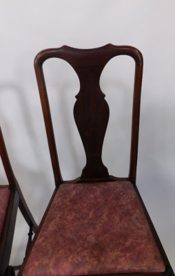 A set of four early 20thC mahogany dining chairs, each with a vase shaped splat and a moulded top, with drop in pink upholstered seats, on cabriole legs, 102cm high, 50cm wide, 42cm deep. - 3