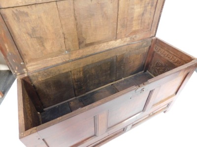 An 18thC oak mule chest, the three panelled top and front above two drawers on stiles, 75cm high, 131cm wide, 47cm deep. - 3