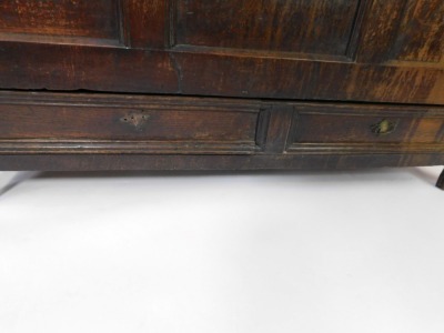 An 18thC oak mule chest, the three panelled top and front above two drawers on stiles, 75cm high, 131cm wide, 47cm deep. - 7