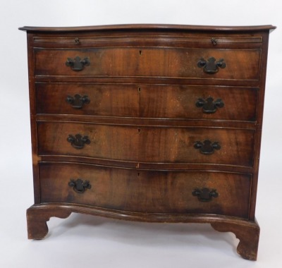 A mahogany serpentine bachelors chest, the shaped front above a brushing slide, and four deep drawers, on bracket feet, cm high, 84cm wide, 46cm deep. - 2