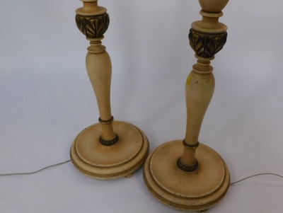 A pair of painted French style standard lamps, each cream painted with gilt highlights, on a circular foot, 155cm high. - 2