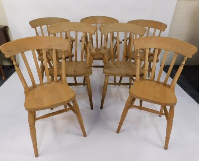 Seven beech kitchen chairs, comprising a set of five carvers, each with splat backs on H stretchers, and a matched paid of single chairs, all stamped Etak R1ahc Slovenia. - 2