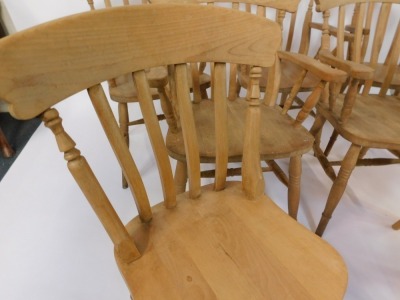 Seven beech kitchen chairs, comprising a set of five carvers, each with splat backs on H stretchers, and a matched paid of single chairs, all stamped Etak R1ahc Slovenia. - 4